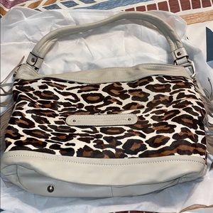 B.  Makowsky leopard print bag